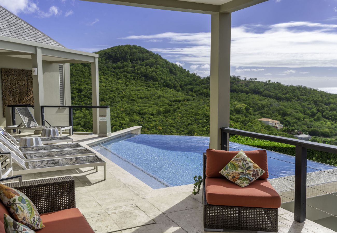 Sun loungers by the private pool at Sugar Ridge villa rental Antigua 