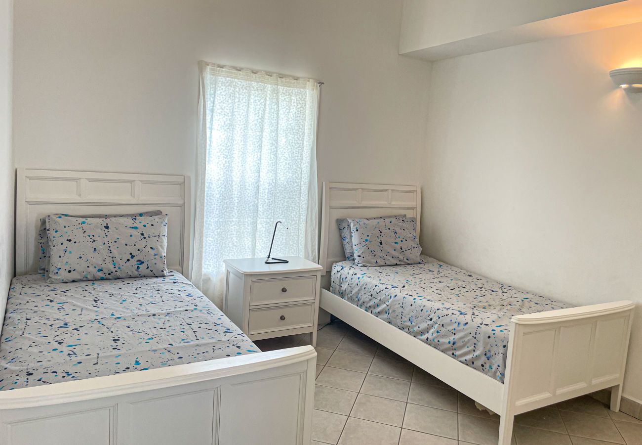 Generously pro­por­tioned bedrooms at Harbour view vila rentals, Antigua