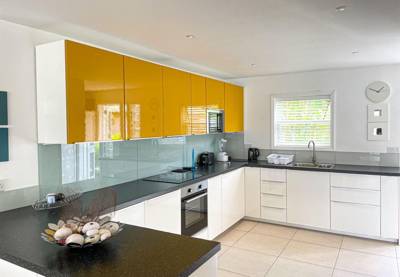 Exceptional styling, state-of-the-art appliances, Two Bedroom Property with Large Sun Deck at Jolly Harbour villa rentals