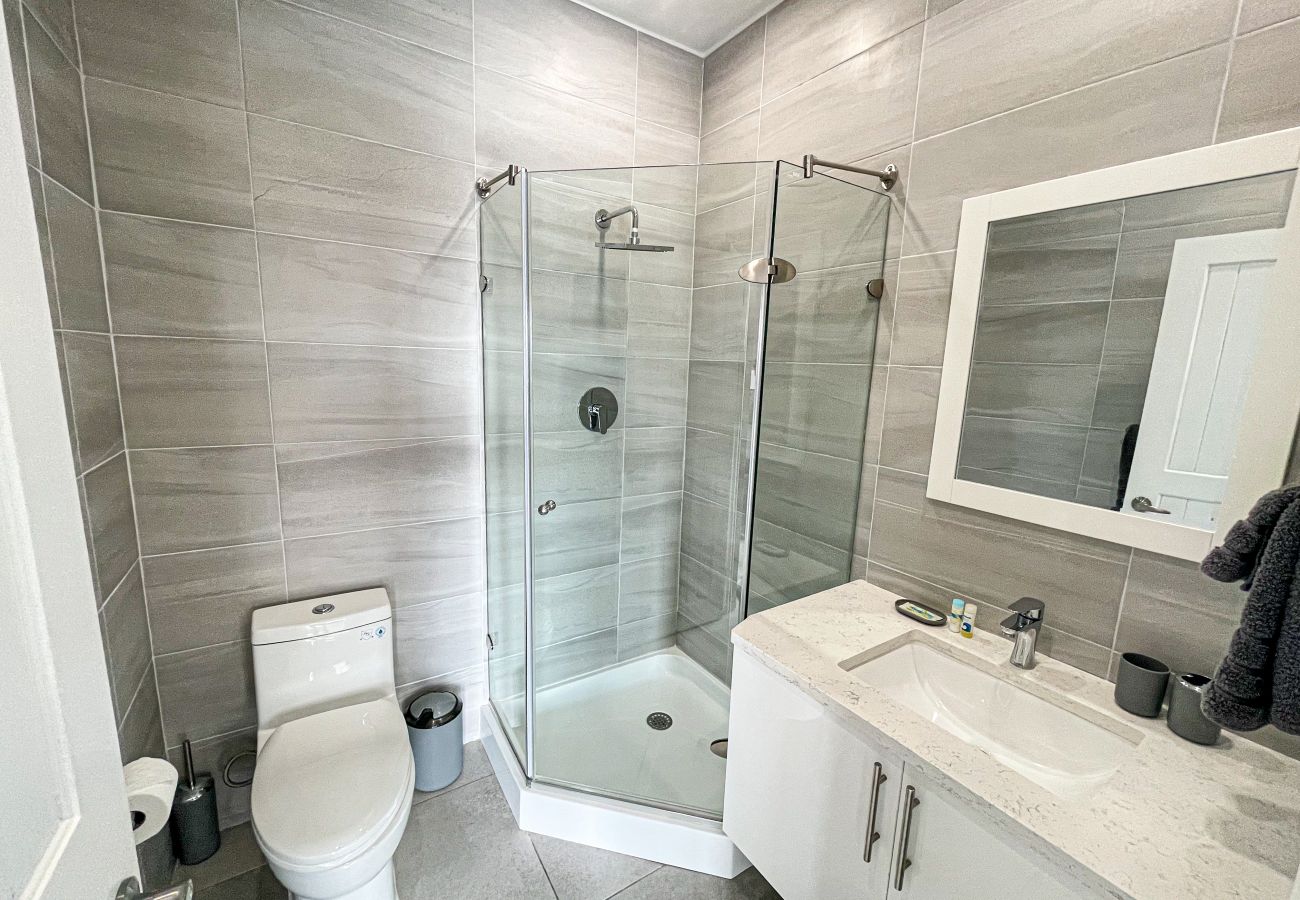 Modern two bedroom with ensuite bathroom and walk-in shower at Jolly Harbour villa rentals