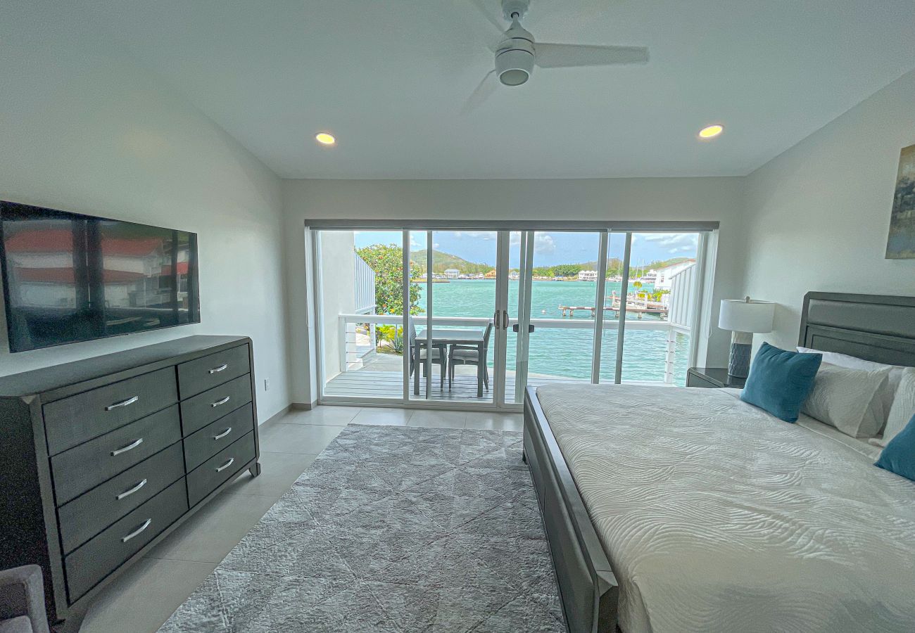 Beautiful waterfront views, King sized bed, air conditioning, en-suite bathroom at Jolly Harbour Villa Rentals