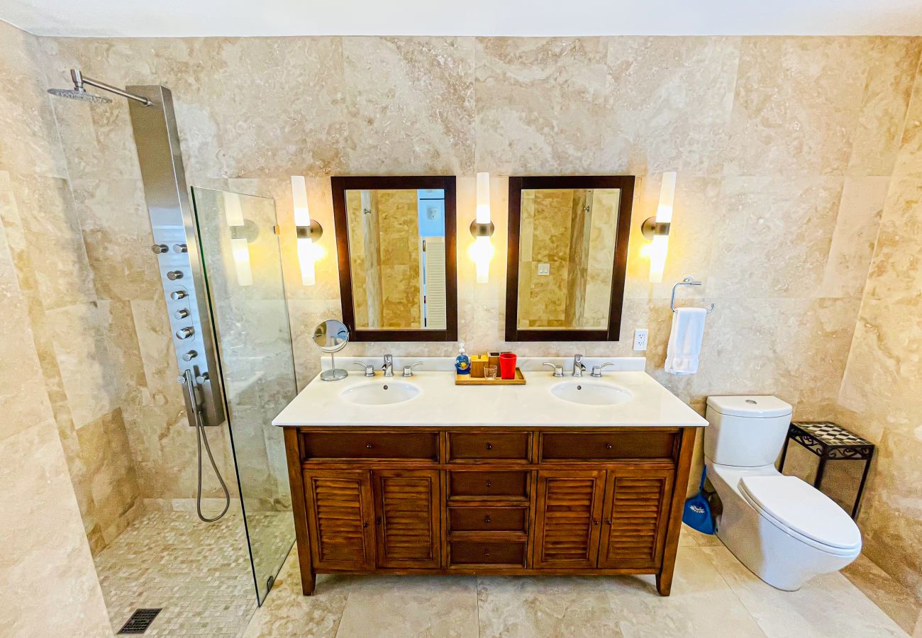 Luxurious en-suite bathrooms with full body showers, and double sinks at Sugar Ridge Villa rentals