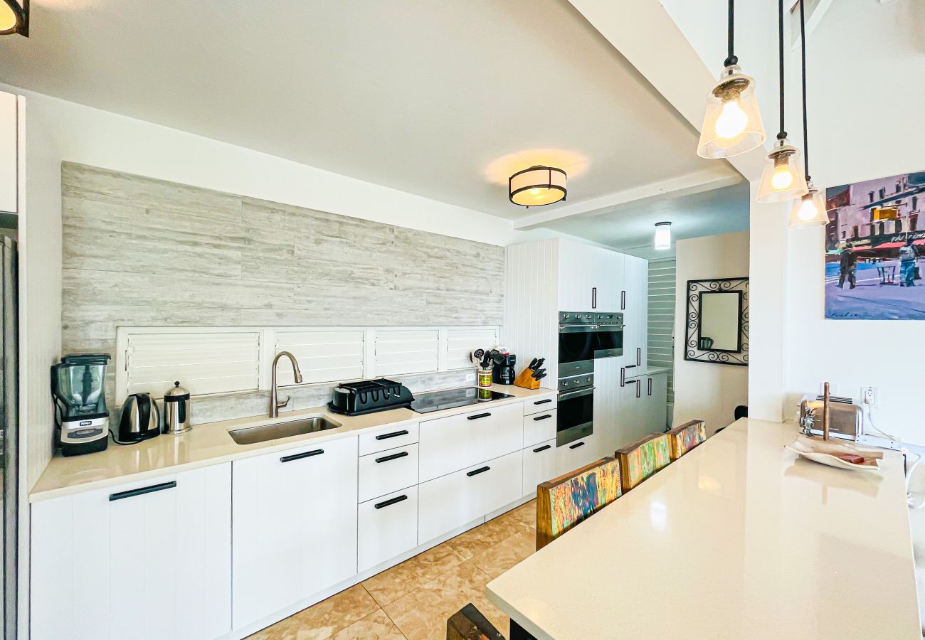 Stunning three-bedroom villa with a designer Italian kitchen with stainless steel appliances at Sugar Ridge Villa rentals