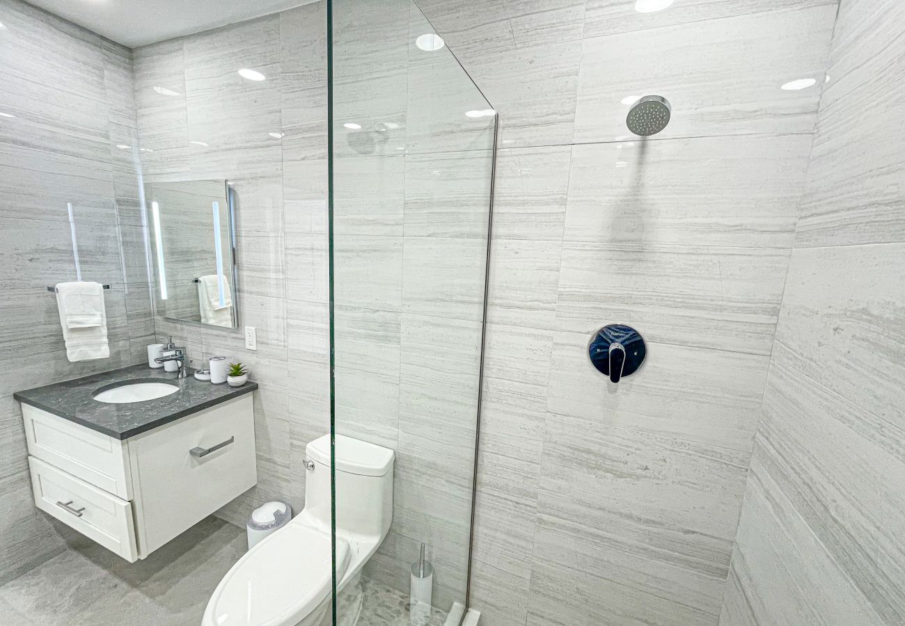 Jolly Harbour Villa Rentals, Modern bathroom, fitted sink, large shower, private balcony 