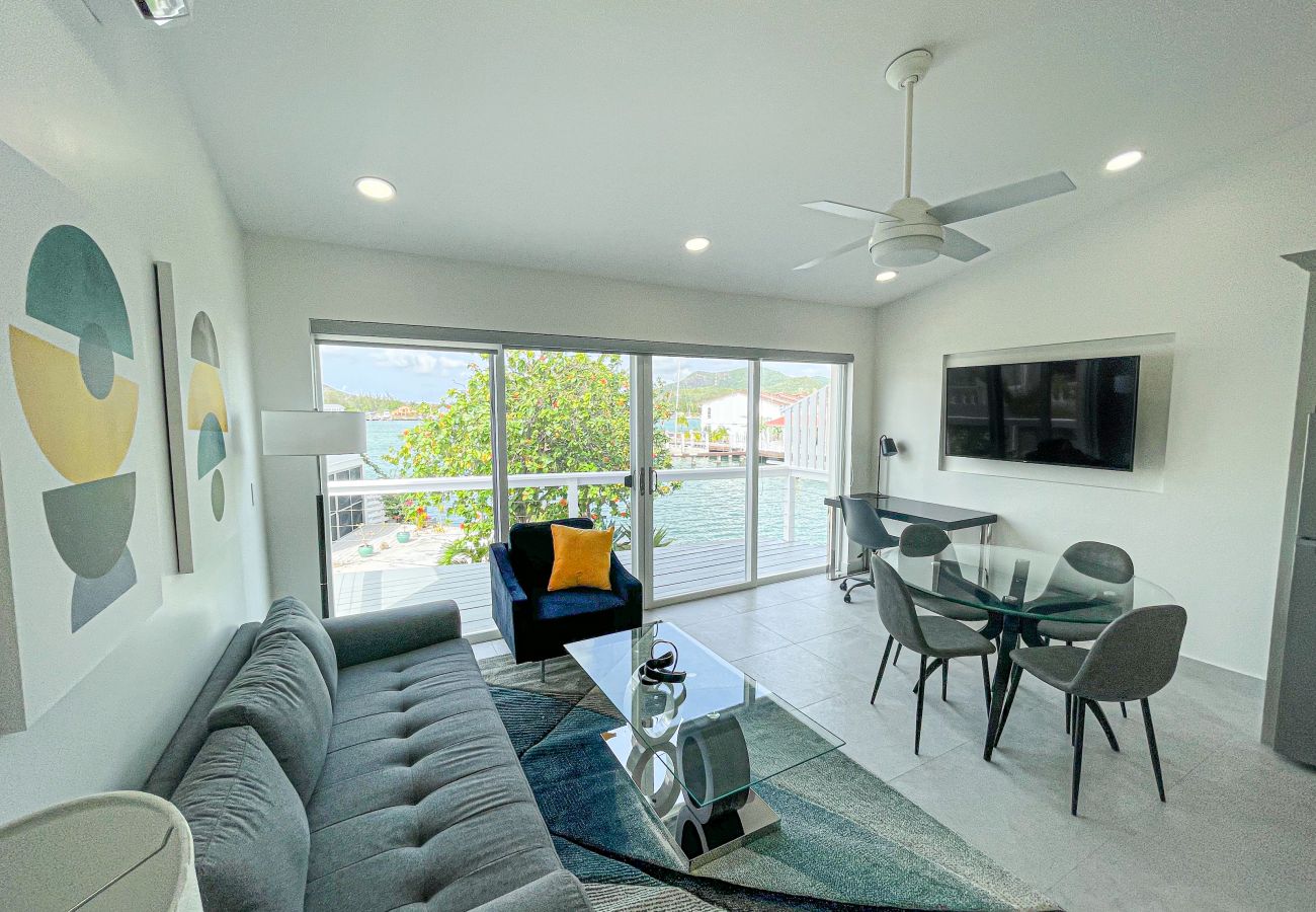 Spacious one-Bedroom Apartment with an open plan interior, cozy living room, and private balcony 