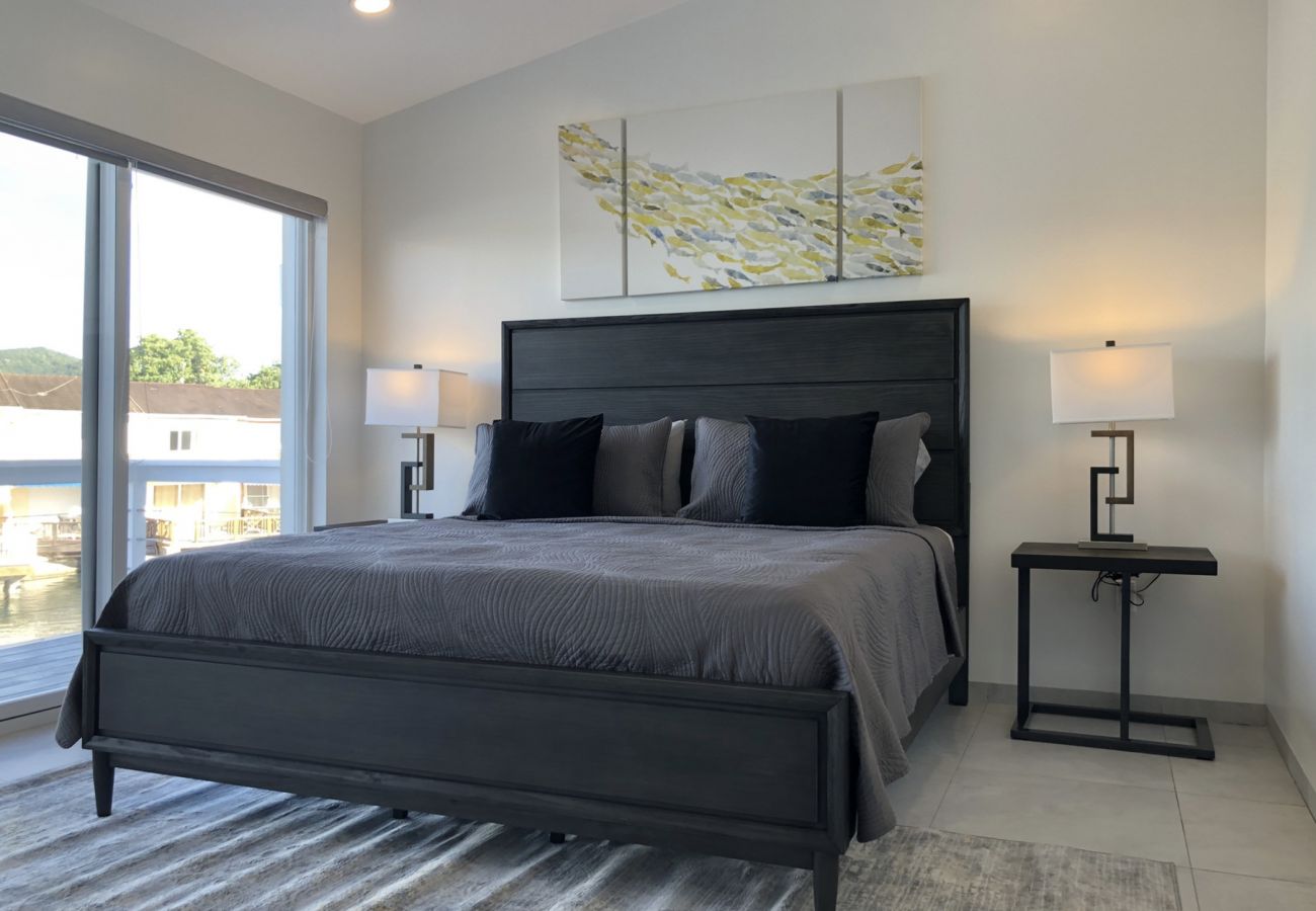 Jolly Harbour Villa Rentals, Private balcony, waterfront views, ensuite shower rooms
