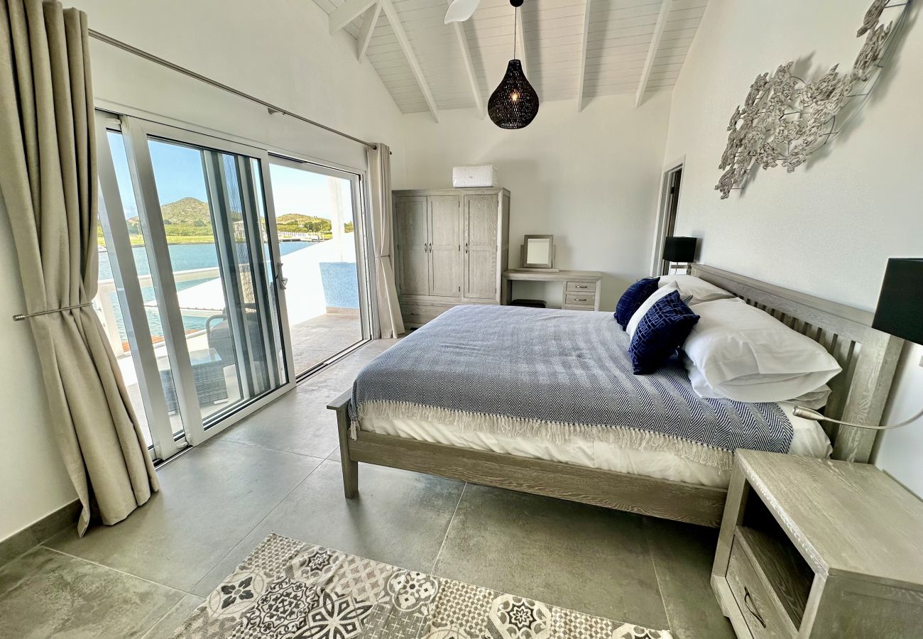 House in Jolly Harbour - New Three Bed Waterfront Villa With Pool