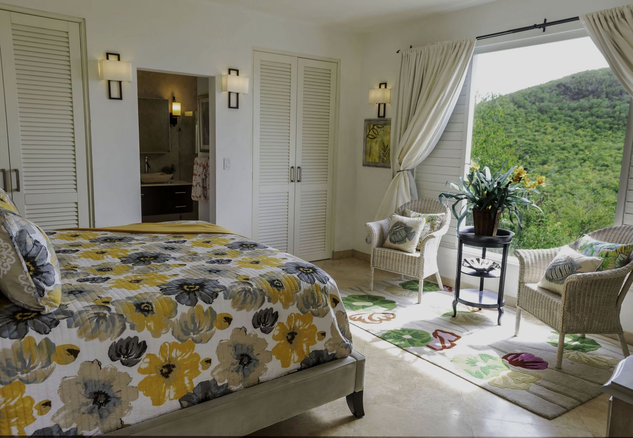 Spacious bedroom with king size bed and ensuite at Sugar Ridge 