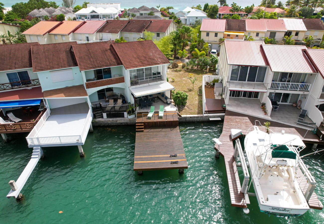 Beautiful views, Alfresco dining, shaded verandah at Jolly Harbour villa rentals, Antigua