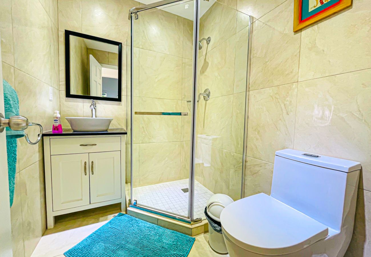 Cozy enclosed walk in shower, with air-conditioning throughout at Harbour View