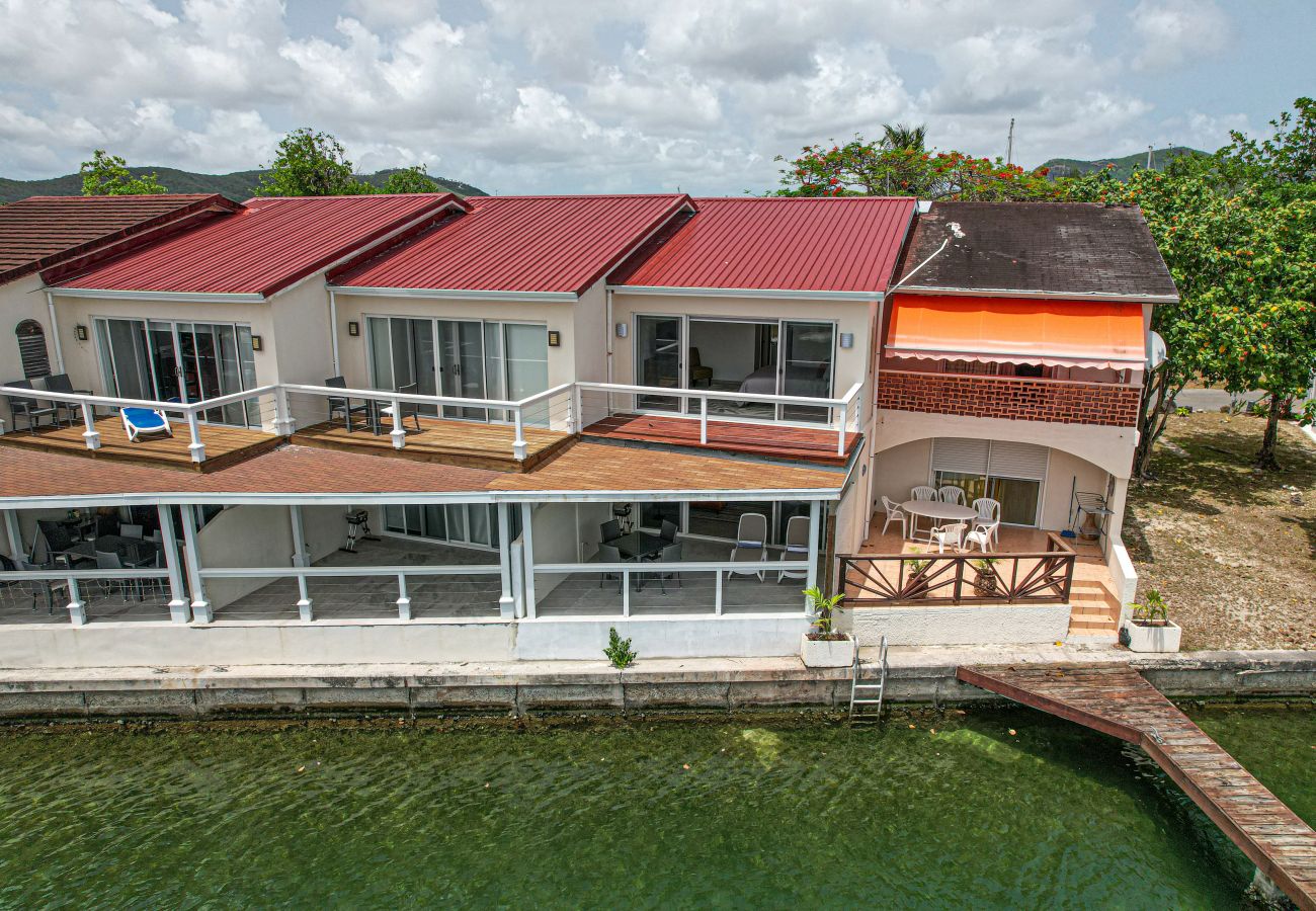 Two Bedroom villa with fully equipped, open-plan kitchen, Private balconies, Indoor and outdoor dining  at Jolly Harbour