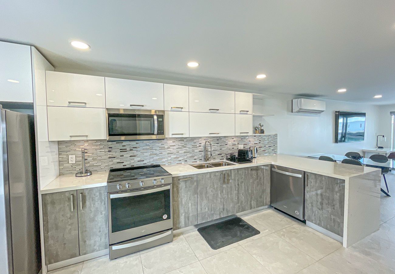 Open plan kitchen, Fitted with a large, double Wolf Hall fridge at Jolly Harbour villa rentals