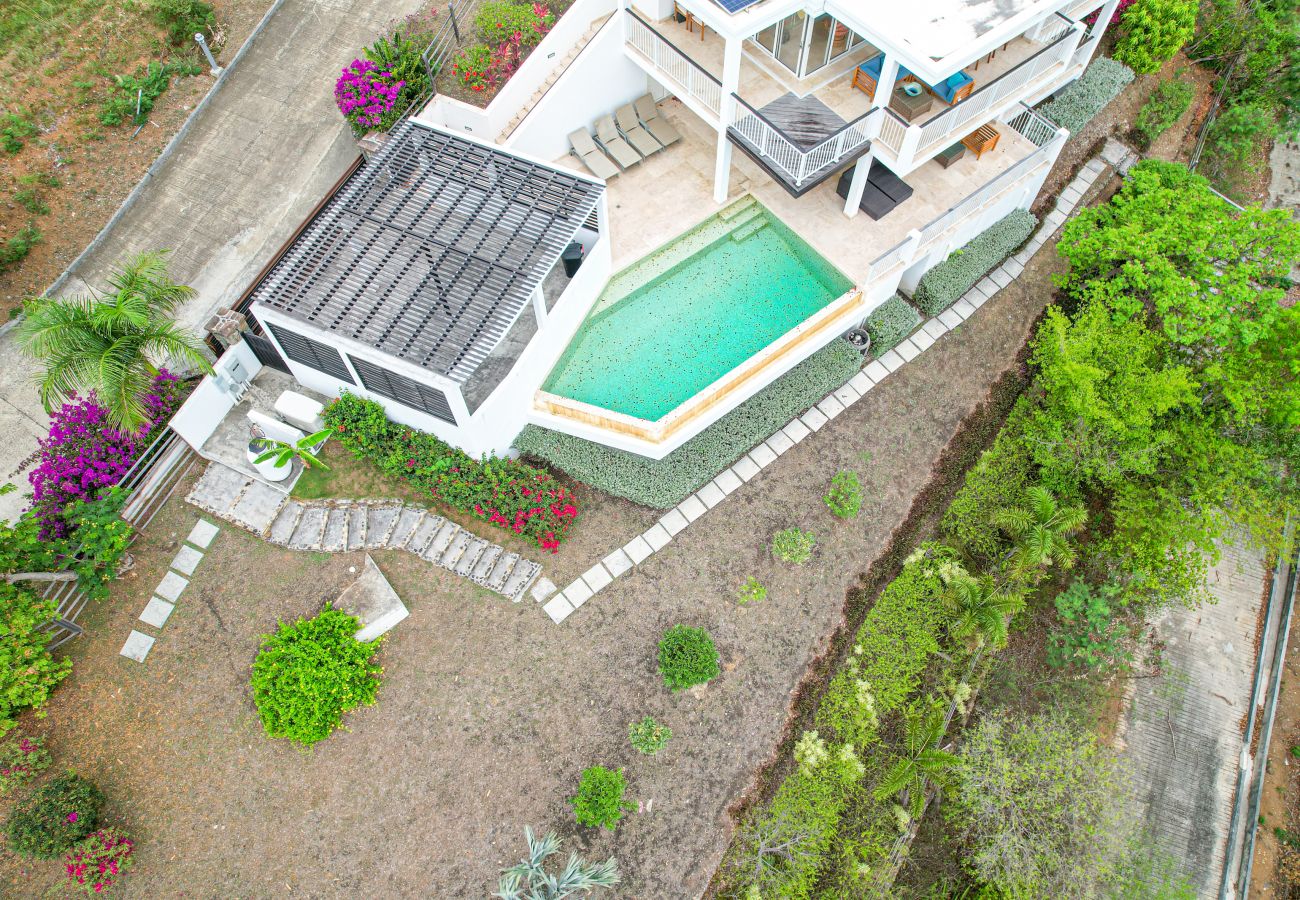 Stunning three-Bedrooms villa with a large swimming pool, louvered windows at Sugar Ridge Villa rentals