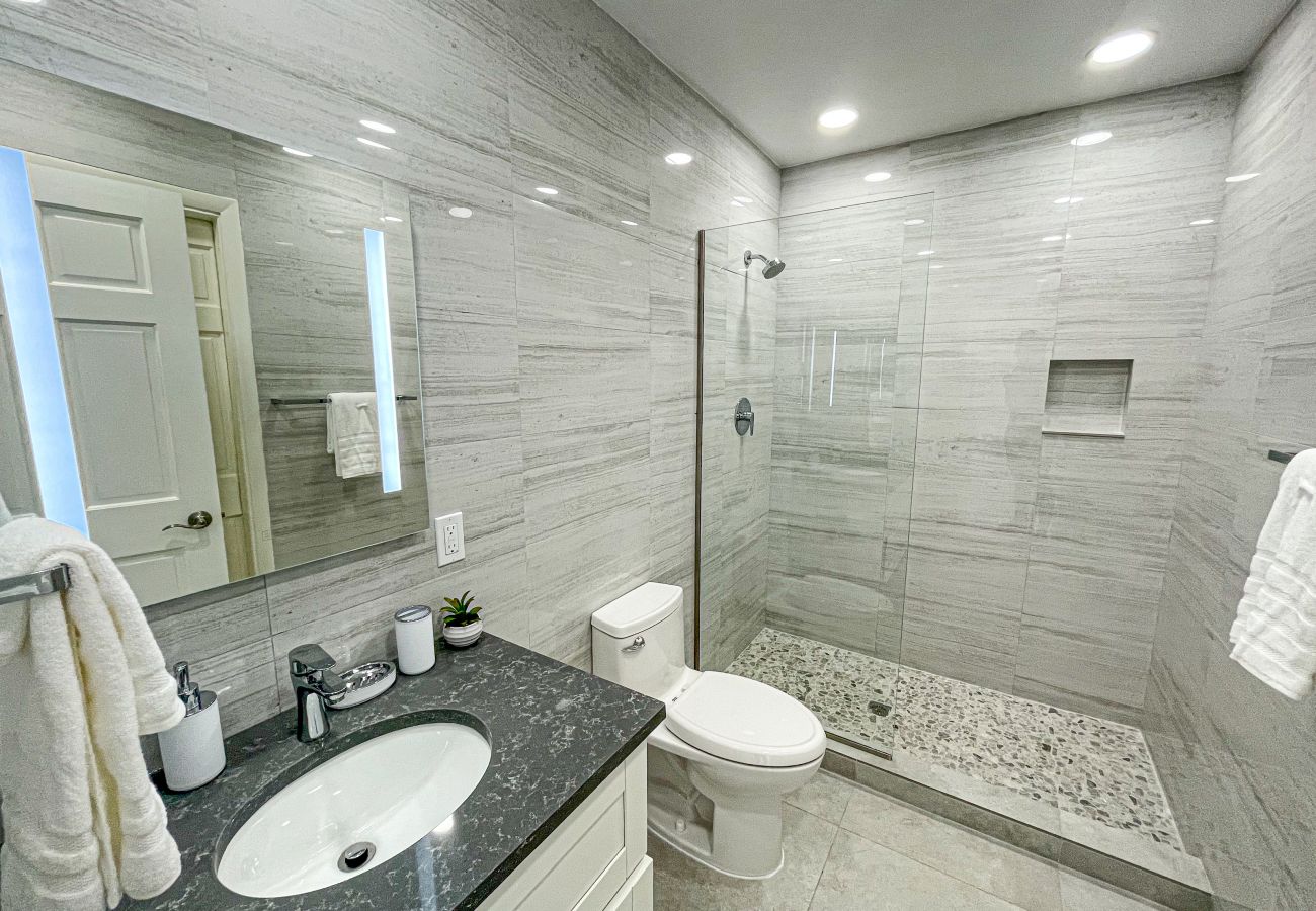 Jolly Harbour Villa Rentals, Modern bathroom, fitted sink, large shower, private balcony
