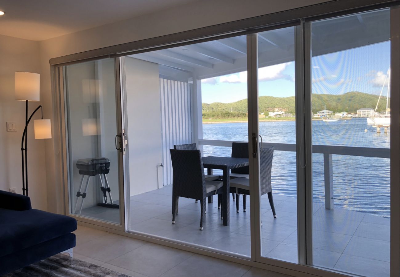 Townhouse in Jolly Harbour - Modern Waterfront Paradise 