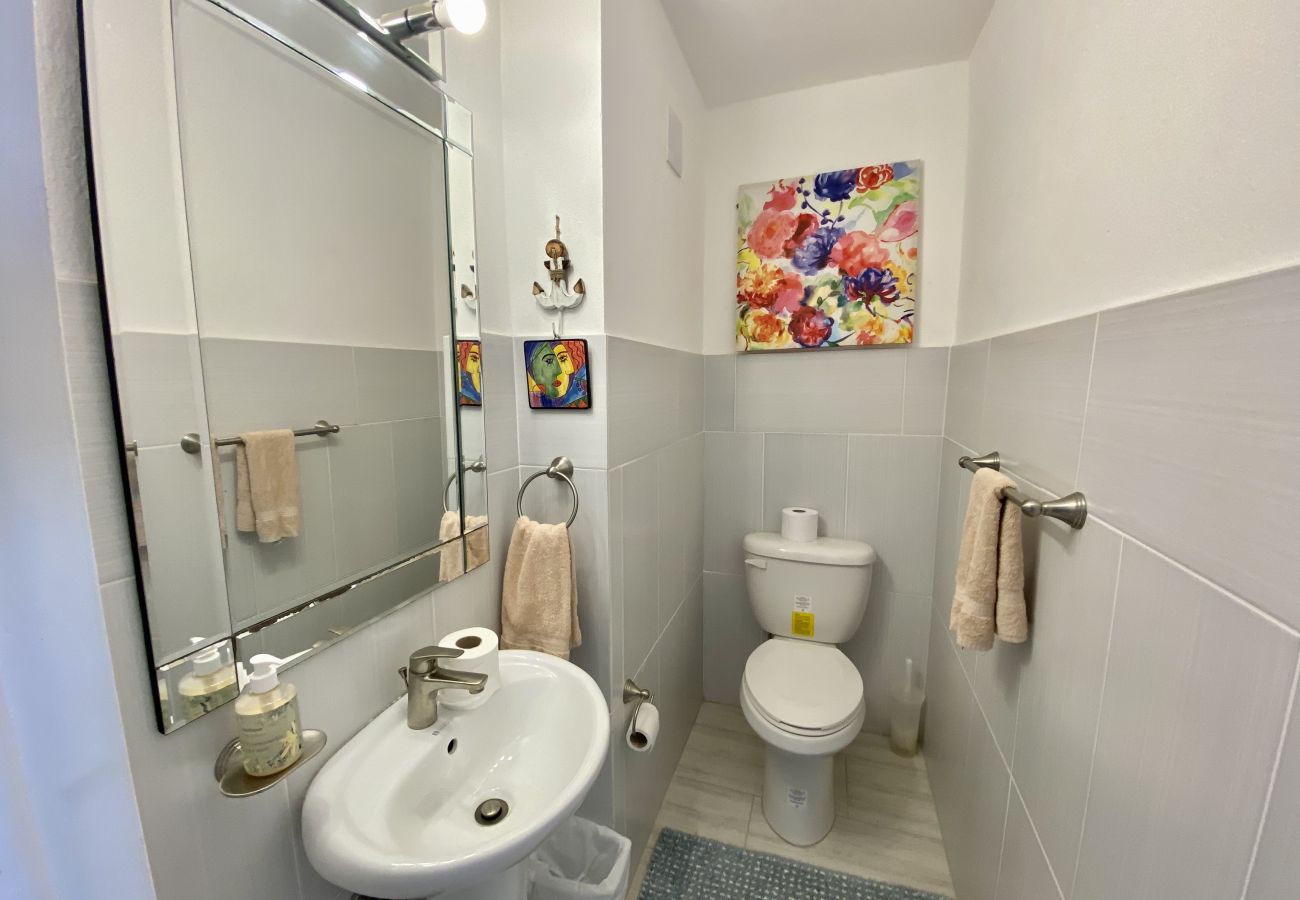 Jolly Harbour Villa rentals, furnished terracotta patio, waterfront views and a fully equipped kitchen