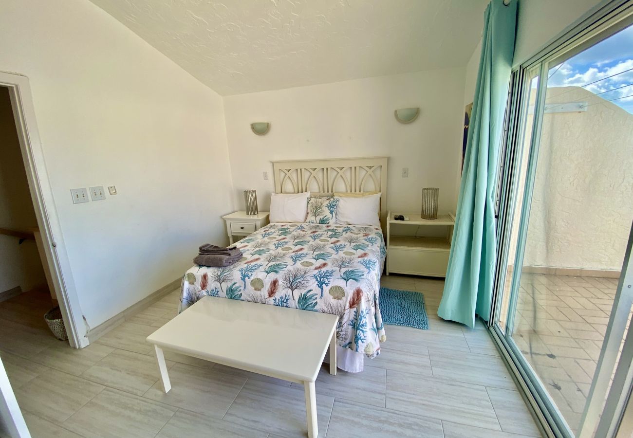 Private balcony, cathedral ceilings, beautiful waterfront views at Jolly Harbour Villa rentals