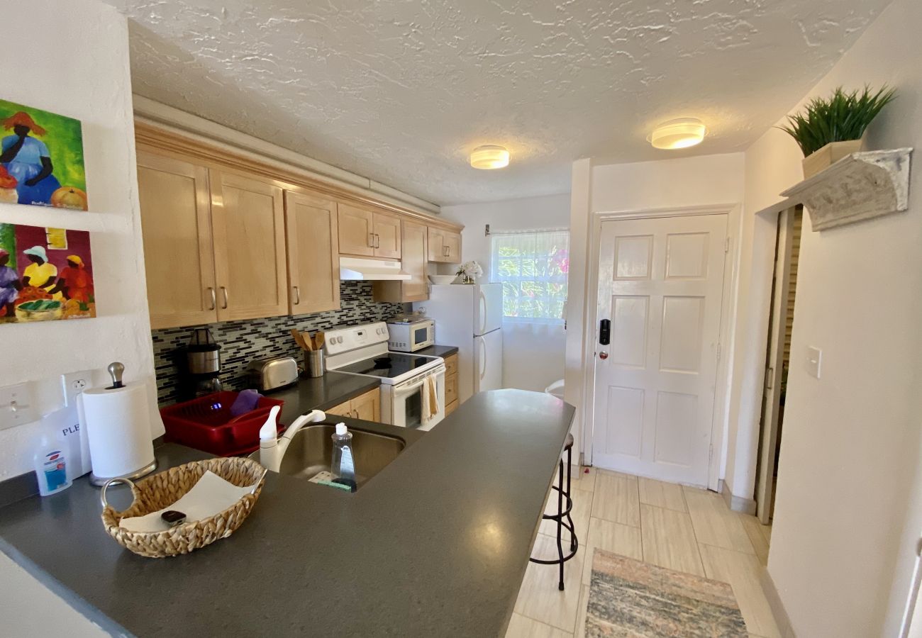 Jolly Harbour villa rentals, fully equipped kitchen, air conditioning, Internet, cable TV, telephone and waterfront views