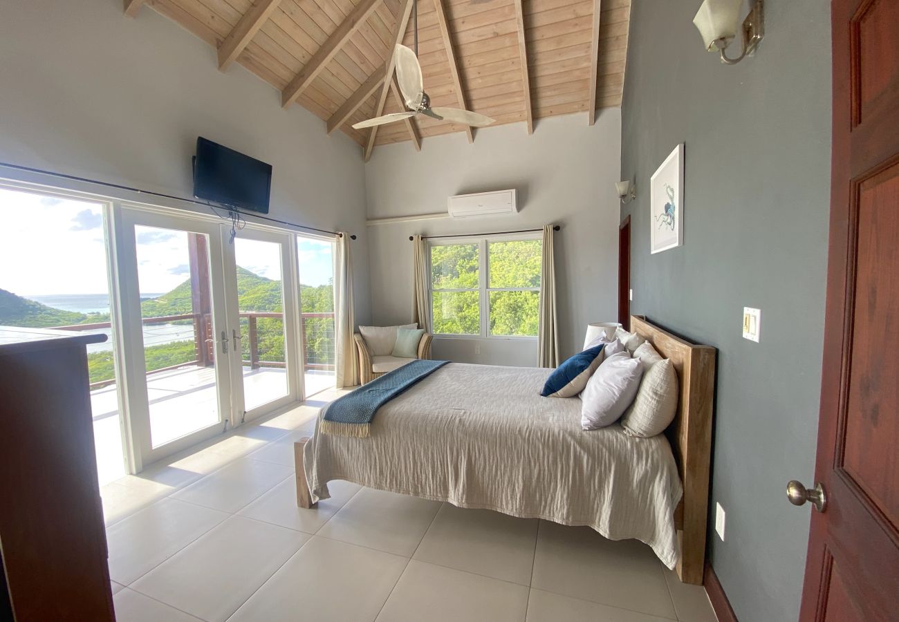 Apartment in Jolly Harbour - A Tranquil Retreat with Panoramic Ocean Views